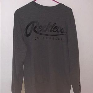 Young and reckless sweatshirt.